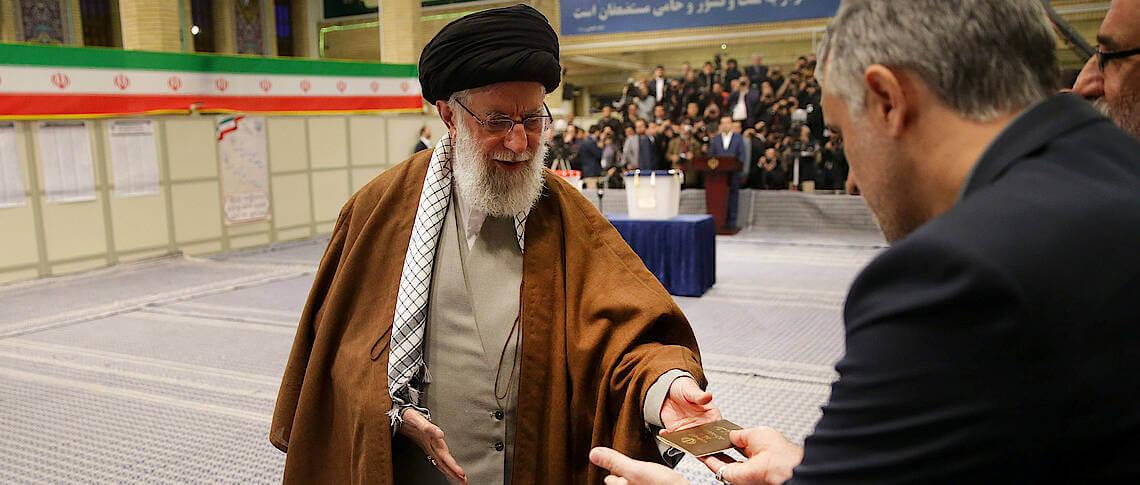 Iran's Supreme Leader Ayatollah Ali Khamenei arrives to cast his vote at a polling station during parliamentary elections in Tehran 